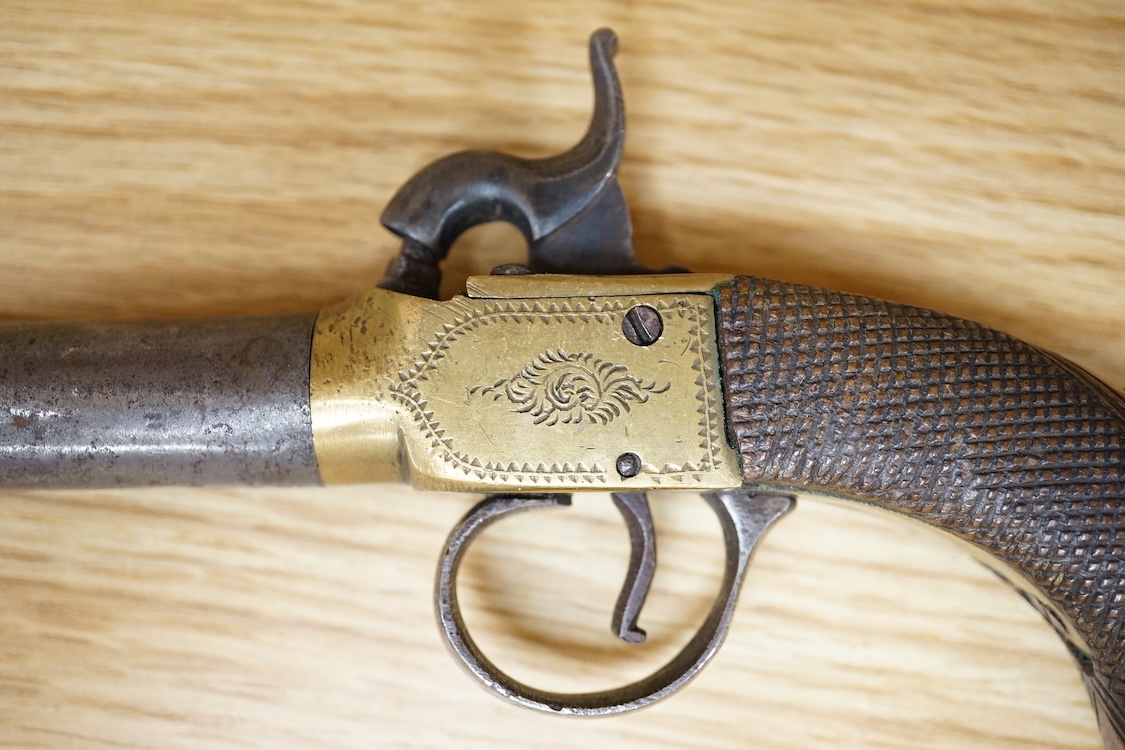 A boxlock percussion pocket pistol with turn off barrel, Birmingham proofs, engraved brass frame, and chequered rounded walnut grip